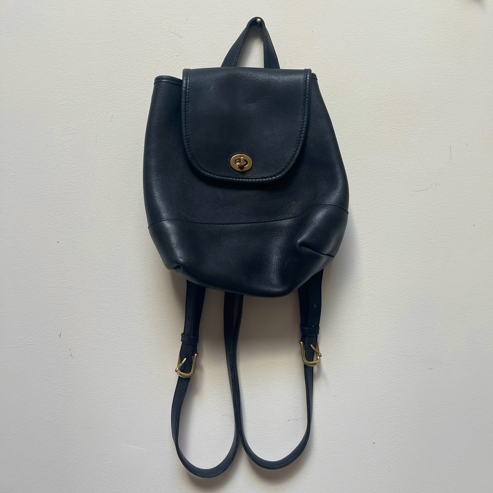 Vintage Leather Coach Mini Backpack drawstring bag with brass hardware circa ‘97